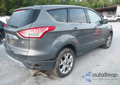 2013 Ford Escape Sel z USA, uszkodzony, nr VIN 1FMCU9H93DUD92992